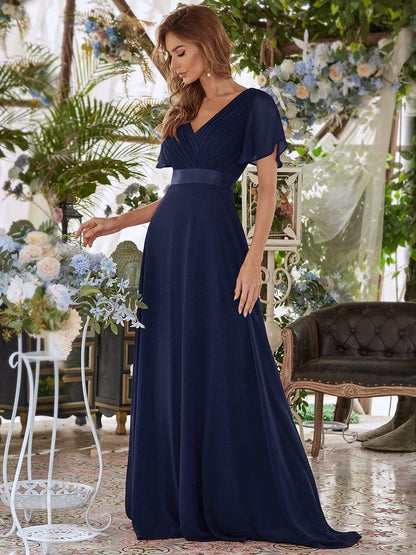 Long Chiffon Empire Waist Bridesmaid Dress with Short Flutter Sleeves #color_Navy Blue